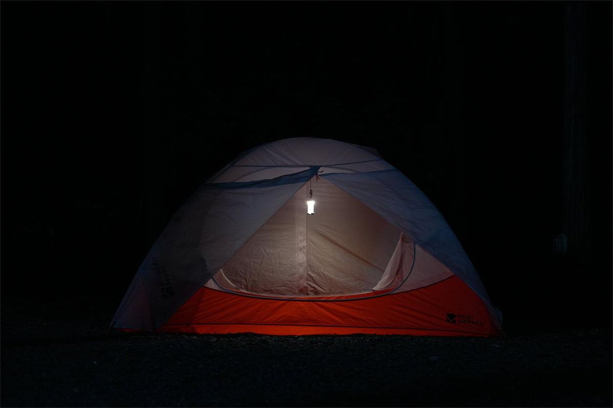 BEAM PUMP hanging as a light over a tent